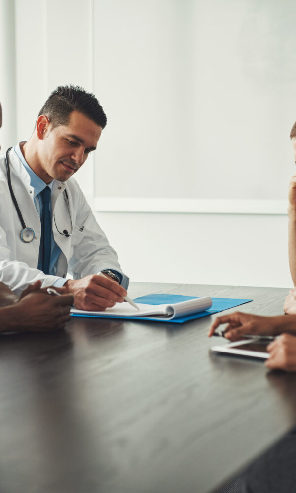 Did I Give Up My Opportunity to Sue Medical team having a meeting with doctors in white lab coats and surgical scrubs